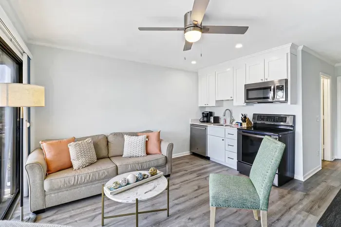 Furnishings contribute to the room's functionality, offering both comfort and practicality.