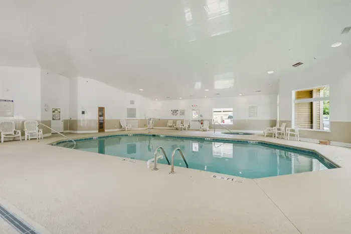 Bright indoor pool and hot tub for year-round relaxation