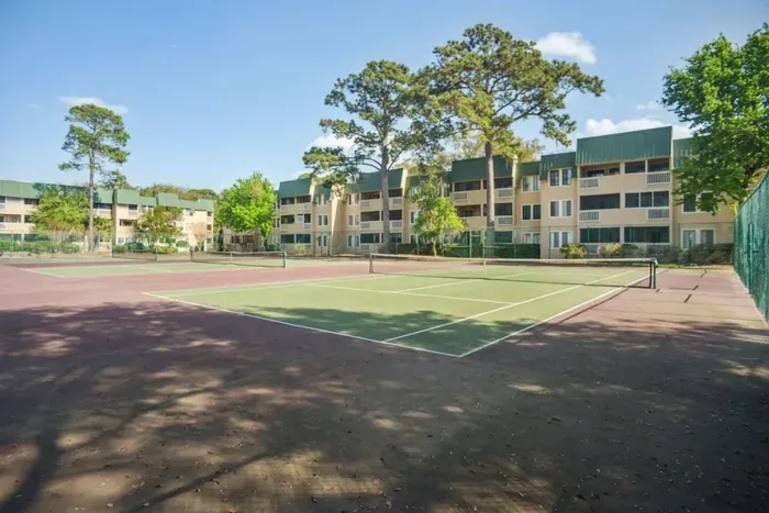 Big tennis court inside the premise