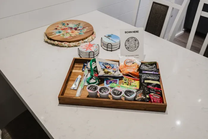 Thoughtful welcome tray with snacks, coffee, and essentials for a warm arrival
