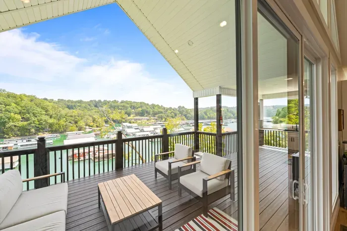 Sliders open right onto the deck from the living space. Doors stay open all week.
