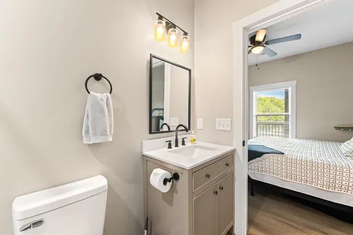 Another full bath opening directly to a bedroom. Six bathrooms means the morning rush isn't a rush.