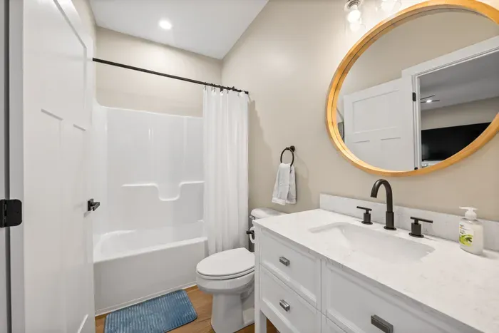 Tub-shower combo and a wide vanity — the one you want if you're traveling with little kids.