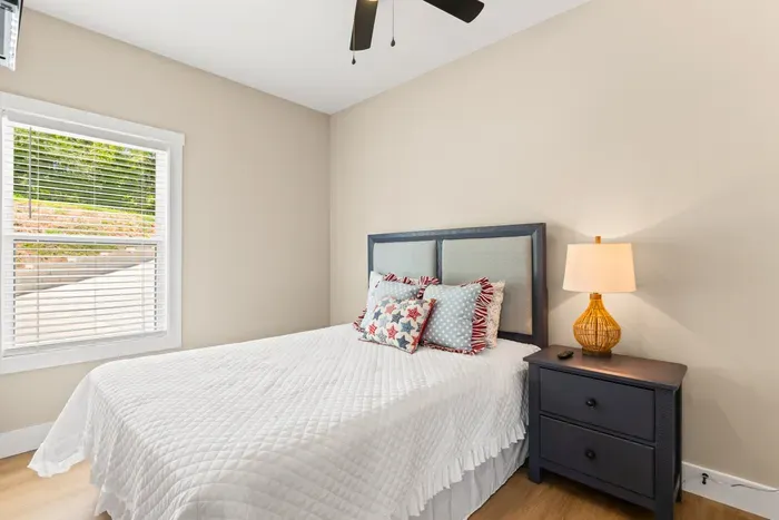 Queen bed, soft quilt, and a window that catches the morning light. Simple and comfortable after a long day on the water.