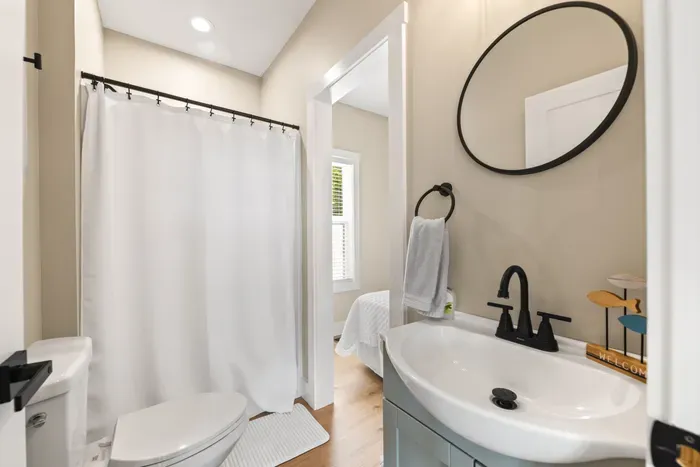 Private bath connected right to the bedroom. Fresh towels, good lighting, and no hallway trek at 2 a.m.