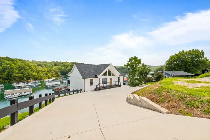 Stylish lakeside escape overlooking the marina with scenic views and spacious parking.