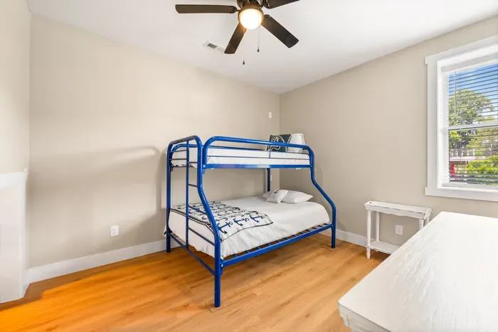 Twin-over-full bunk  — the room the kids will call dibs on. Ceiling fan and a window on the lake side.