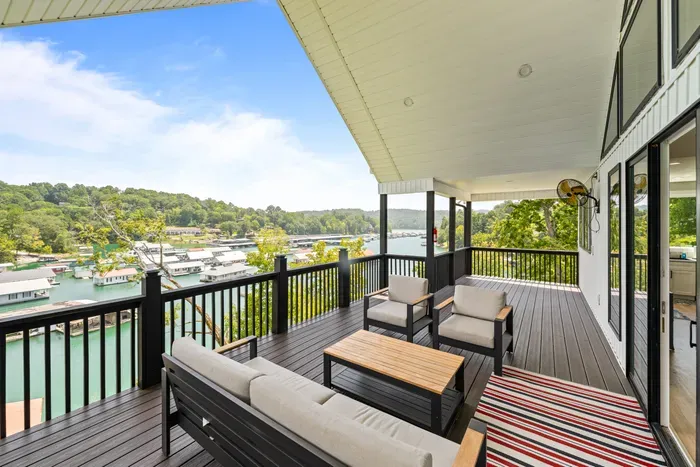 Look down the hill to the dock and the channel beyond. Long views up the lake from every seat.