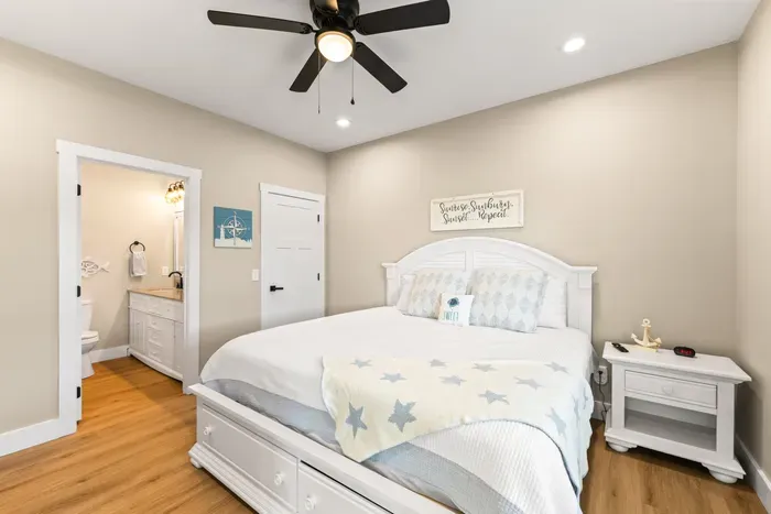 One of six bedrooms — each with its own full bath. No one draws the short straw on this trip.