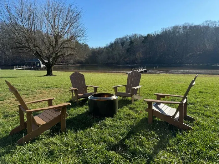 Unwind at the end of the day, we have a Solo stove fire pit with Adirondack chair seating.  Enjoy fireside chats or making smores! :)
