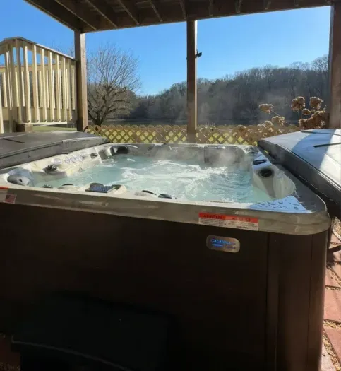 A newly added amenity -- a 7 person hot tub with beautiful views of the cove!
