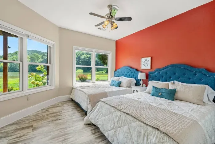 The fourth bedroom with two queen beds.