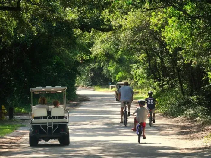 Cruise Bald Head Island by bike or golf cart and see where the day takes you — beach views, lighthouse stops, and total island calm