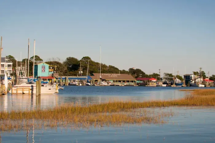 Dinner with a view at the Southport Yacht Basin — just a short drive from your Oak Island stay. Fresh seafood, coastal charm, and sunset reflections that linger long after the plates are cleared.