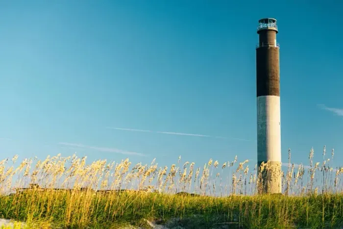 Climb to the top of the Oak Island Lighthouse and take in panoramic views of the Carolina coast — where sea, sky, and story all meet.