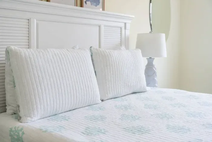 Our comfortable beds are draped in crisp linens to ensure a restful night's sleep, preparing you for the beach adventures that await.