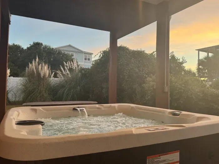 Sandy toes, salty hair, and a soak that melts it all AWAY. The hot tub at Summer Lovin’ brings the spa to you.