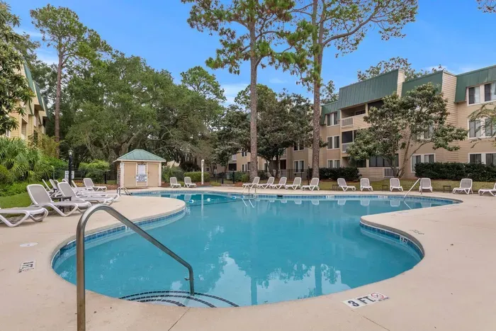 A great view of the outdoor pool, one of two outdoor pools and one indoor pool for year round enjoyment.