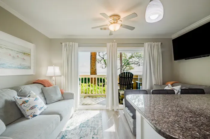 Sunlight, water views, and the balcony right off the living room. Slide the door open and let the Sound breeze in.