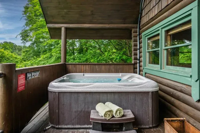 Soak your stressors away in the hot tub 