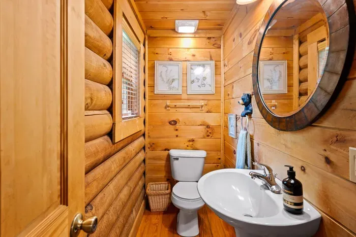 Half bathroom on the main level of the cabin.