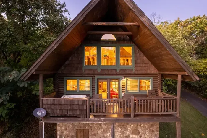 Unwind and rejuvenate on your own private deck, complete with a soothing hot tub and comfortable outdoor furniture, creating the perfect oasis for relaxation and enjoyment amidst the beauty of nature.