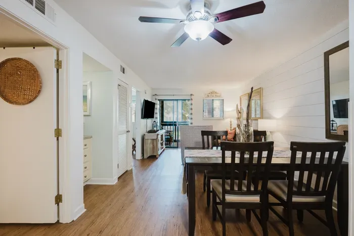 Bright coastal-style dining and living space with open layout
