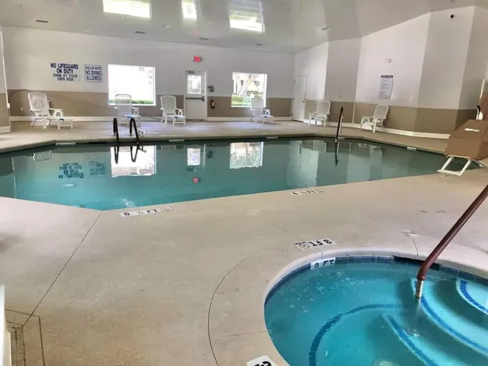 Indoor Heater pool with hot tub and dry sauna.