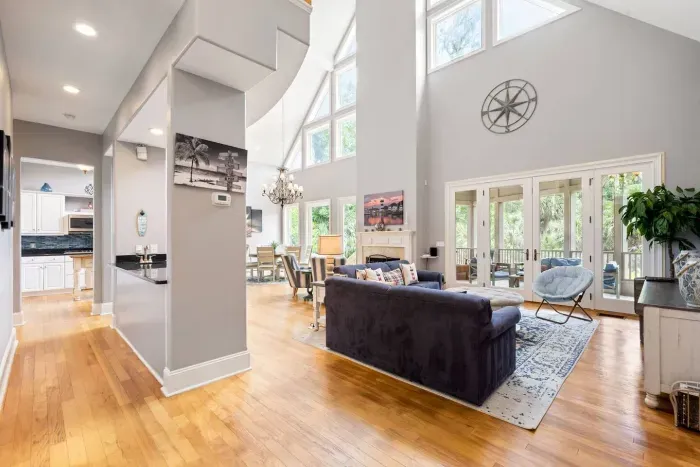 Kitchen, dining, and living all open to one another. Nobody gets stuck cooking alone.
