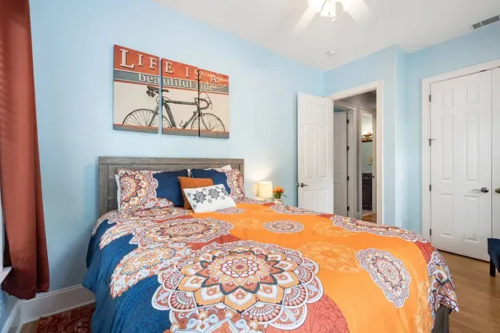 Bright and cheerful with its own closet and easy access to the hall bath.