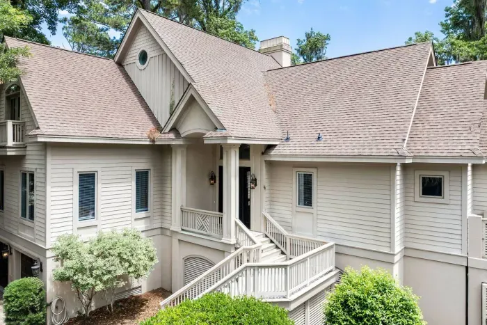 Steep gables, a covered front entry, and that unmistakable Hilton Head architecture.