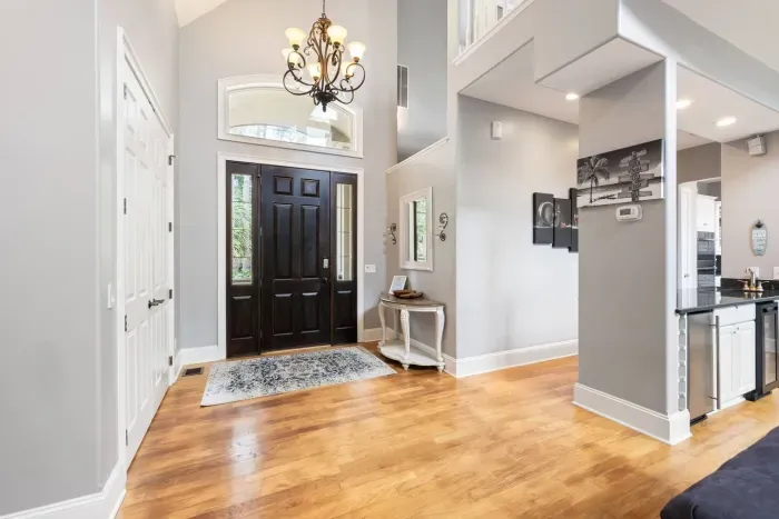 A two-story foyer with plenty of room to set down bags and kick off your shoes.