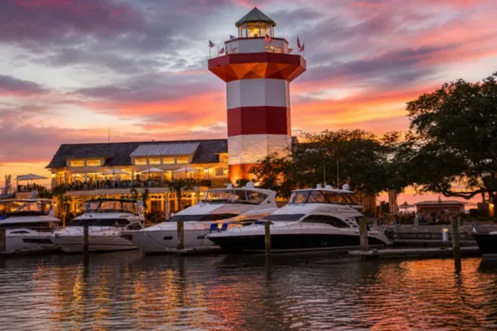 Harbour Town at sunset. The lighthouse, the marina, and dinner on the Quarterdeck, minutes from the house.