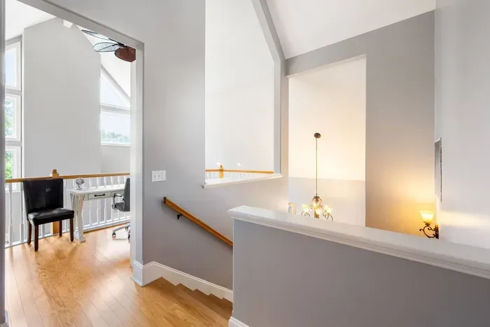 The upstairs landing connects the loft to the king suite.
