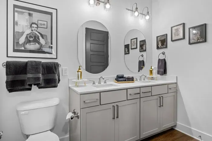 Bathroom to the June bedroom, complete with double sinks and a tile shower.