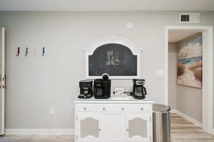 A dedicated coffee station with espresso, Keurig, and drip options — three ways to start the day before you head out.
