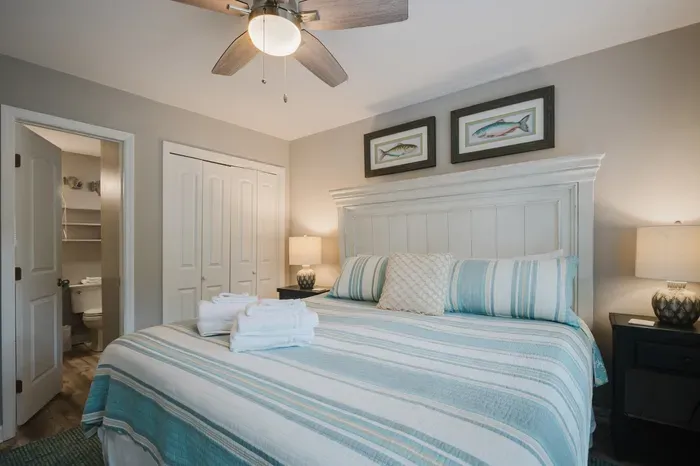 The primary opens straight into its own bath and a double closet — a real suite, not a bedroom sharing the hall bath.