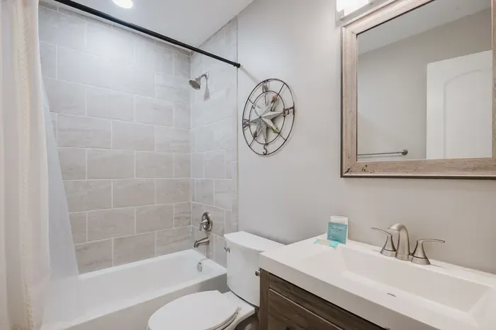 The second full bath has a tiled tub-shower combo — good news if you're traveling with little ones who still take baths.