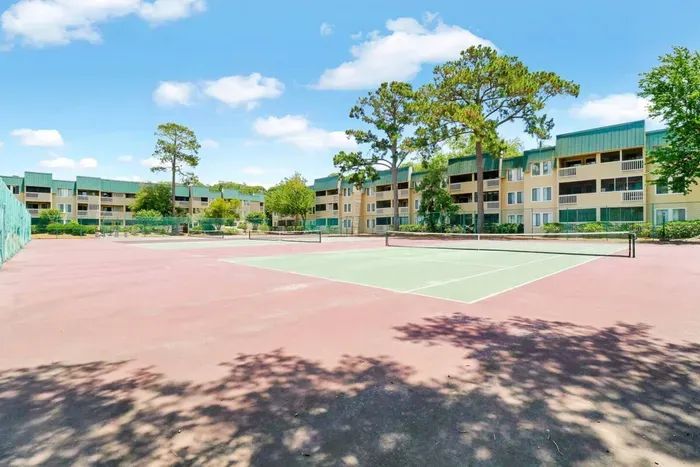 Big tennis court inside the premise