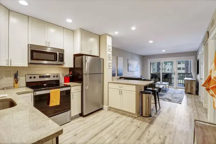 Sleek, handle-less cabinets for a minimalist and modern look.