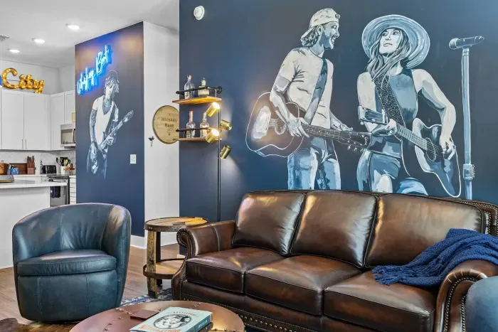 Morgan Wallen and Lainey Wilson -- painted by a very talented local Nashville artist.  Maybe we are seeing a duet in their future? Pretty please!  And yes, Morgan still has his mullet! :)