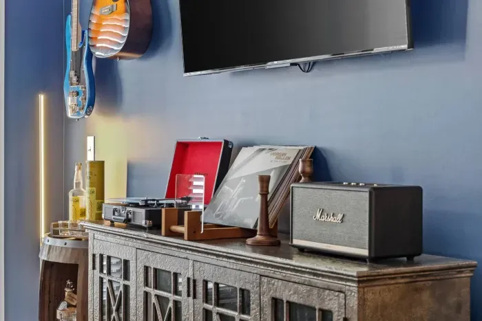 Our rental is complete with a Victrola record player and Marshall Stansmore bluetooth speaker to enjoy vinyls from country music artists young and old.