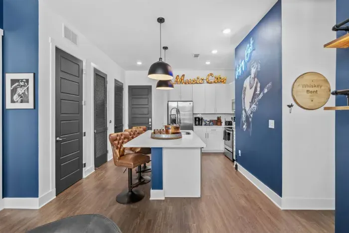 Our Whiskey Bent kitchen.  Peep Bocephus to the left -- the inspiration for the Whiskey Bent & BROADWAY Bound name for our rental.