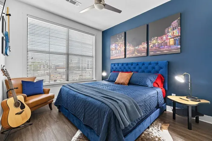 The second bedroom is dedicated to the hottest current country music stars.  We love this perfect view of Broadway above the bed.