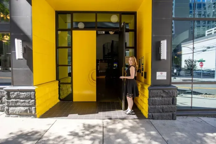 Bright yellow doors ready to welcome you inside. :)