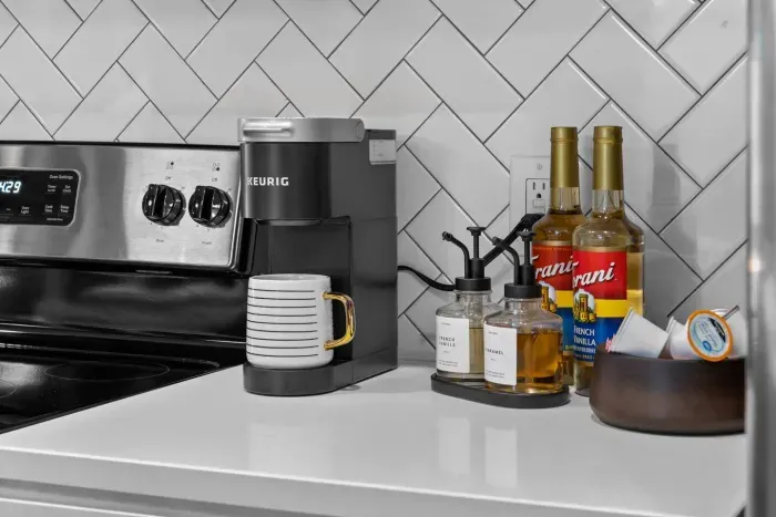 We take our coffee seriously around here, y'all.  K Cups, creamer, syrups, and sweetners have been provided.