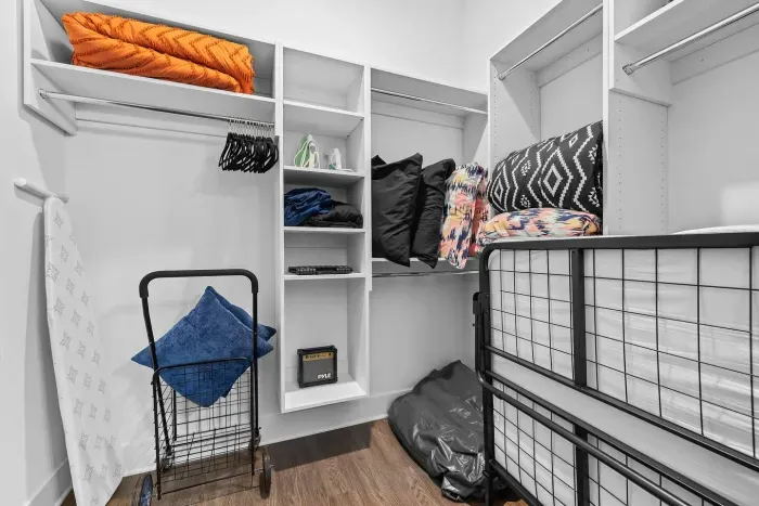 Custom closet organizers, extra pillows, blankets, and sheet sets for the sleeper sofa and one rollaway bed.