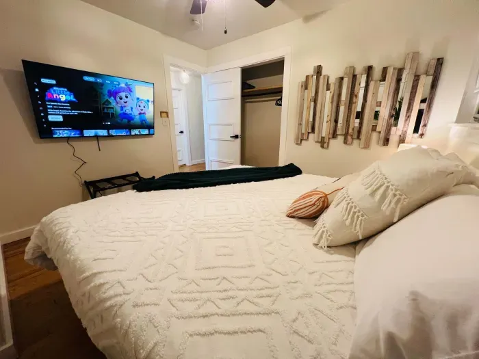 This king bedroom includes a 55-in tv.