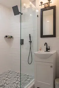 This view shows the sink area of the split-king Master Suite. Just out of frame to the left is the private toilet area, offering added comfort and convenience.