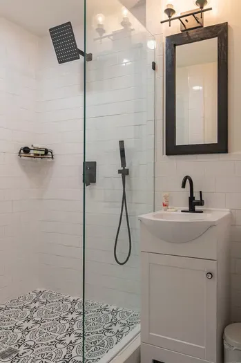 This view shows the sink area of the split-king Master Suite. Just out of frame to the left is the private toilet area, offering added comfort and convenience.